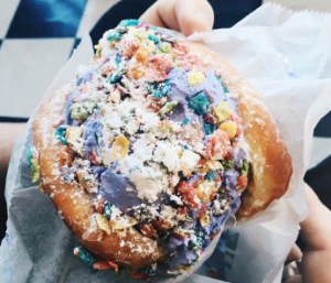 An ice cream-filled doughnut sandwich at House of Ice Cream. PHOTO BY MIDORI MORITA