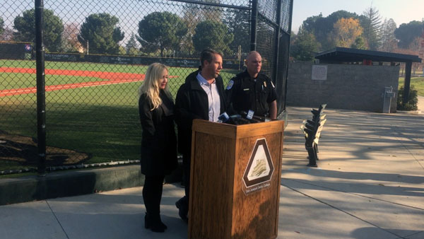Sean Riley speaks to the crowd at a news conference regarding multiple rewards being offered for information about the death of his son