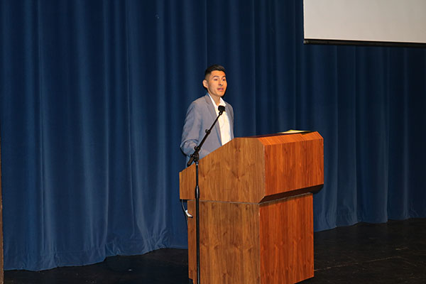 Keynote speaker Max Vargas speaking about his story of migrating to the United States as a child. Photo by Tyra Green