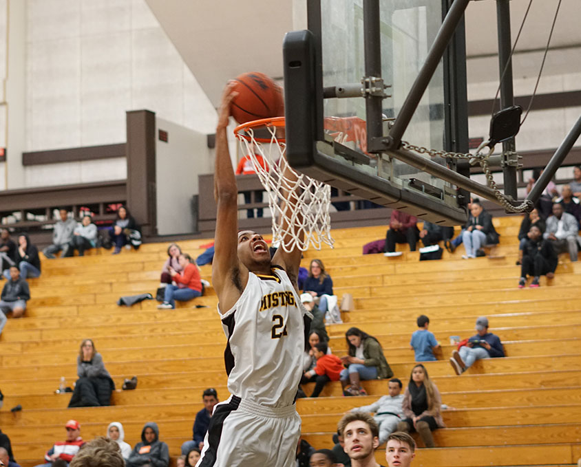 Spencer Monteiro goes up for a dunk.Photo by Marshal Romo