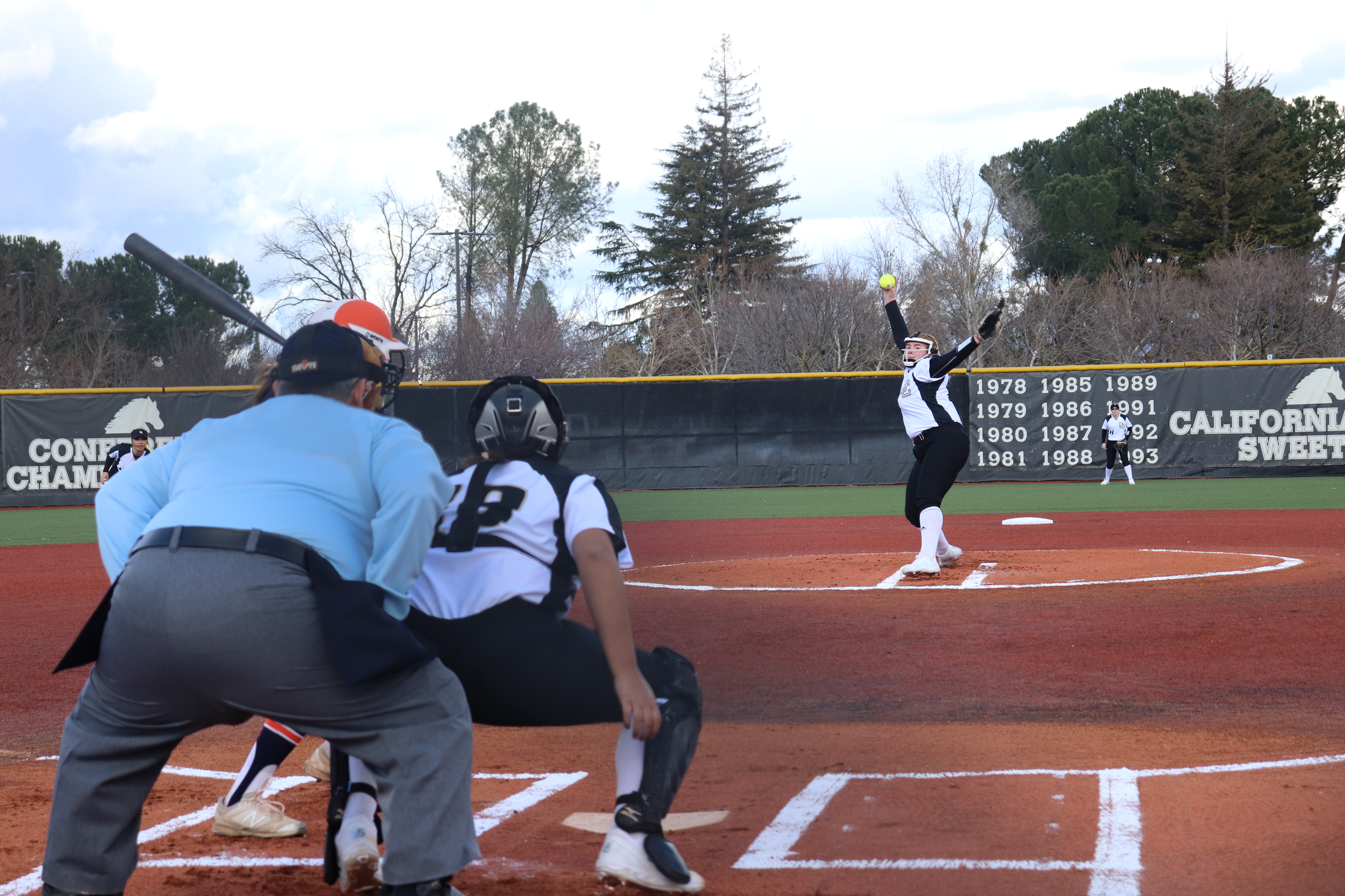 Delaney Pamplin throws a pitch during the season opener. Photo by Paul Muyskens