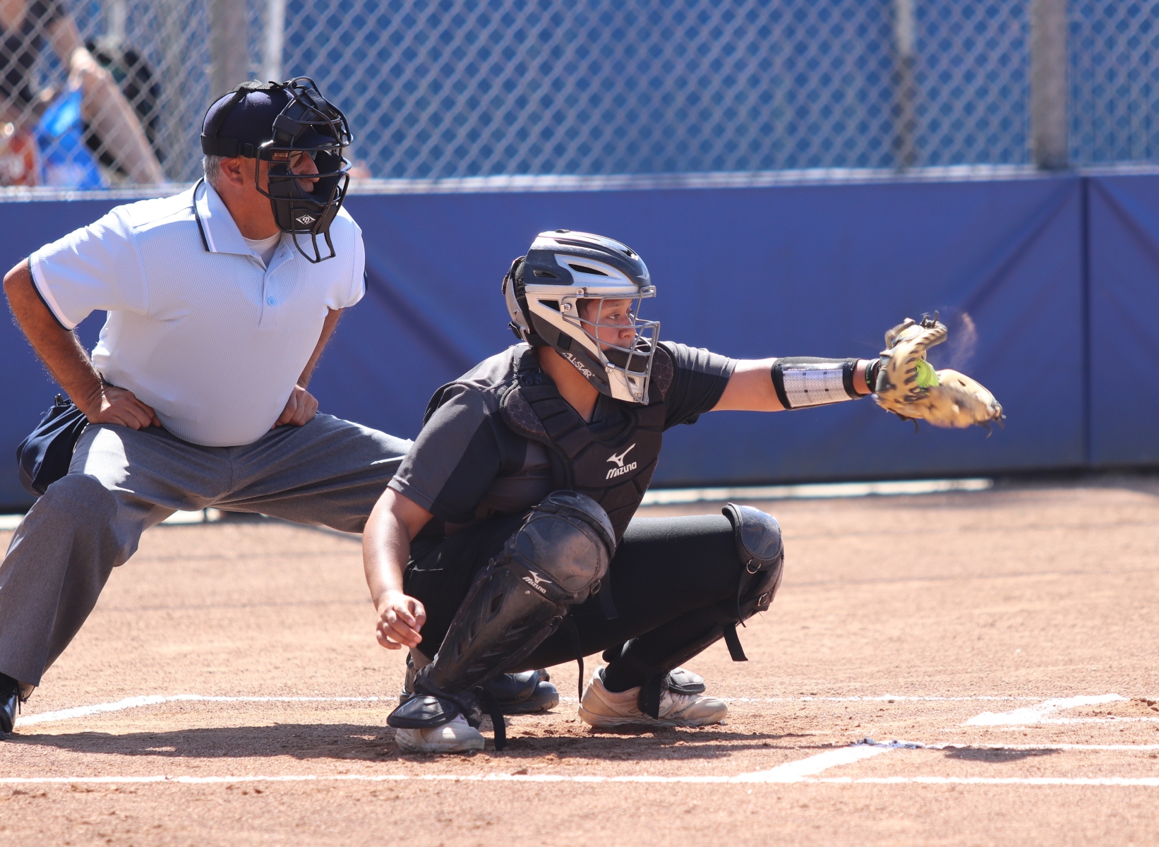 Janelle Rodriguez catches a pitch during the final game of the season