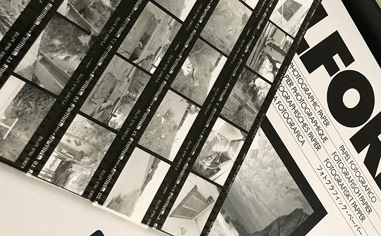 Film photography supplies used in 1A; contact sheet and photo paper box. Photos by Vivienne Aguilar.