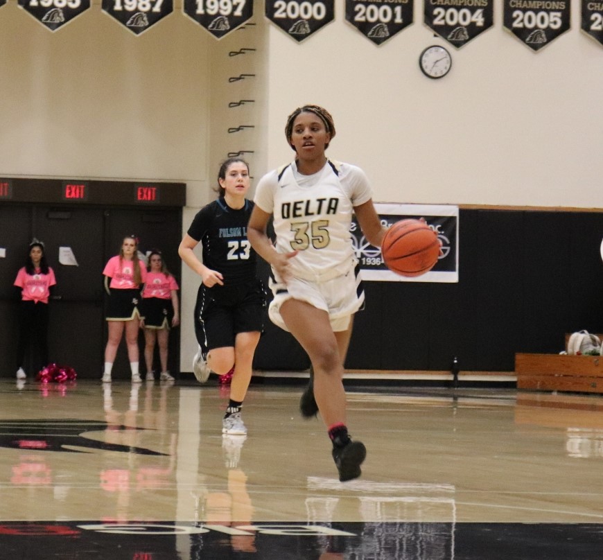 Kendall Weary brings the ball up court in a game last season against Folsom Lake.