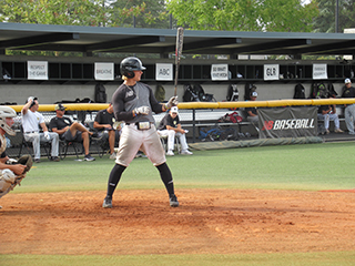 Max Hill bats during practice. Photo by Matthew Millsap
