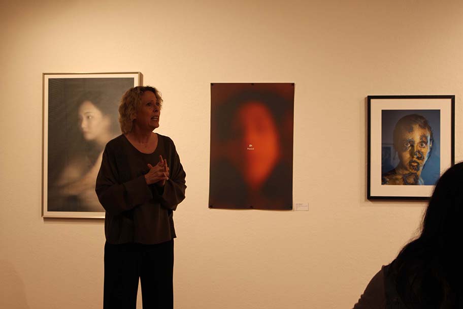 Gallery Director Jan Marlese speaks at the Contemporary Portraiture exhibit at Horton Art Gallery at Delta. Photo by Ayaana Williams