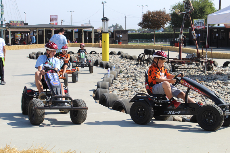Children racing at Dell’Osso Family Farm on Oct 2. PHOTO BY JAHDAI SPIKES