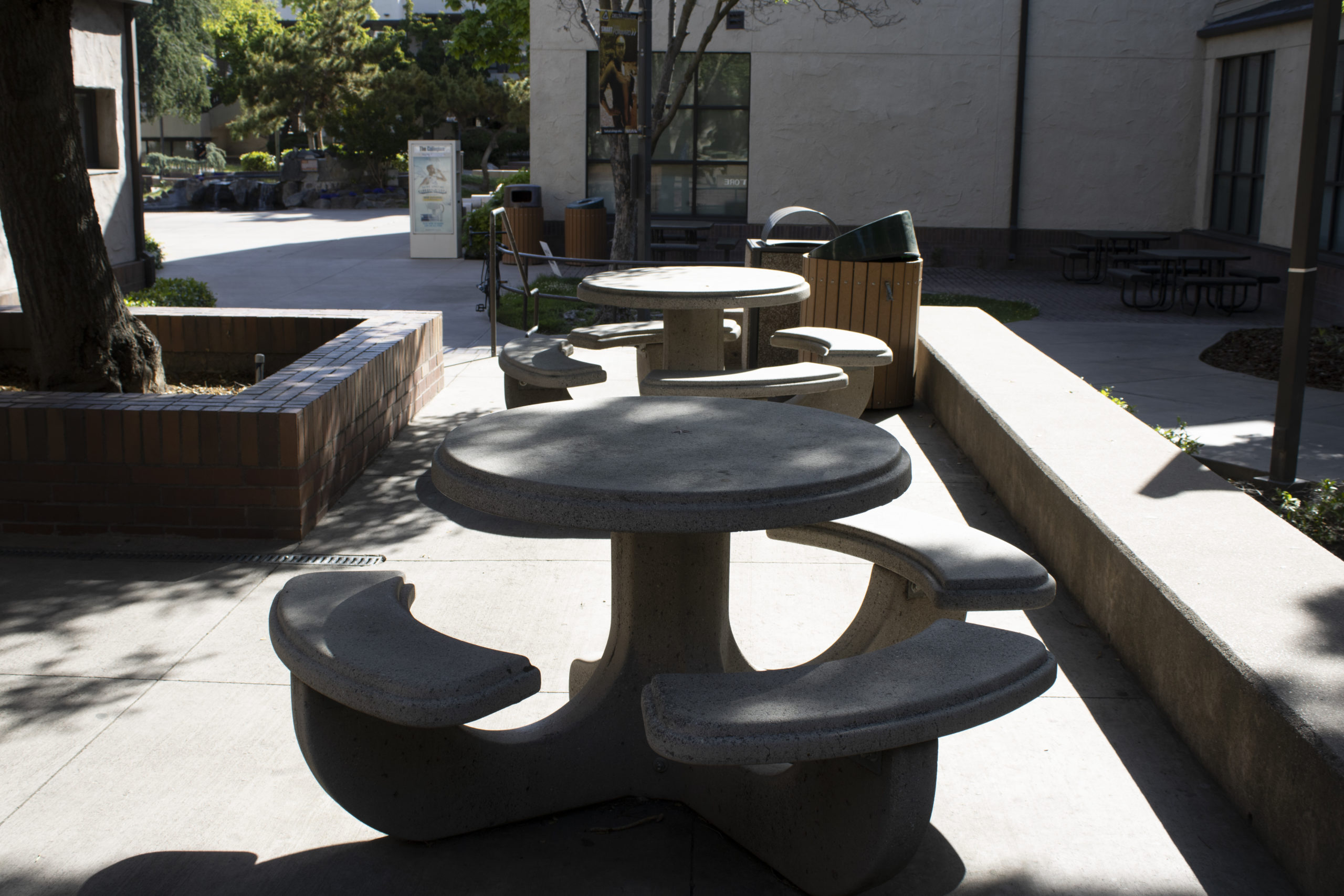 Empty tables sit outside Danner Hall. Photo by Christina Goodman