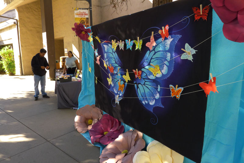 A large artwork featuring a butterfly is depicted to commemorate the beginning of Undocumented Student Action Week. PHOTO BY FRANK PERALTA
