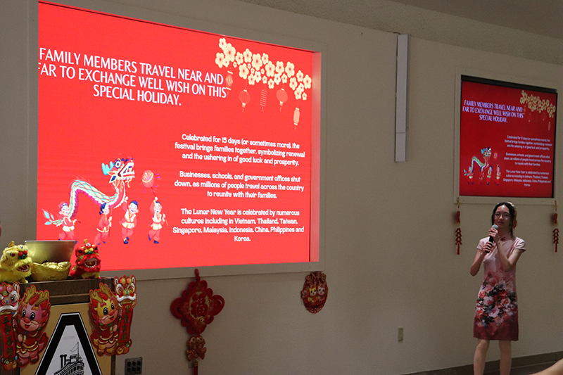 Ema Fua gives a presentation on Lunar New Year during an event at Danner Hall on Feb. 8. PHOTO BY JELISSA KING