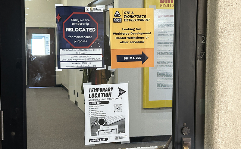 A sign on the door of Shima 217 directs students away from the Career Education and Workforce Development Center on March 7