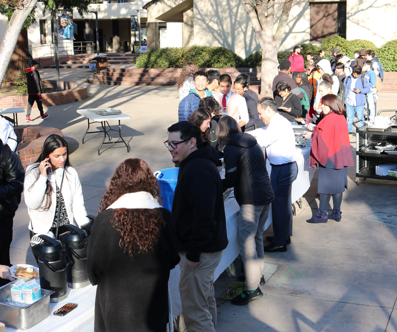 Students line for pancakes with the President on Jan. 13, 2015. PHOTO BY LEVI GOERZEN