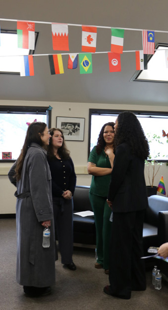 Collegian student editors Andrea Rivera, left back, and Jelissa King, right back, talk to Anna Wolfe, left front, and Caitlin Dickerson, right front, at the Pulitzer on the Road student event on Feb. 13. PHOTO BY LEVI GOERZEN