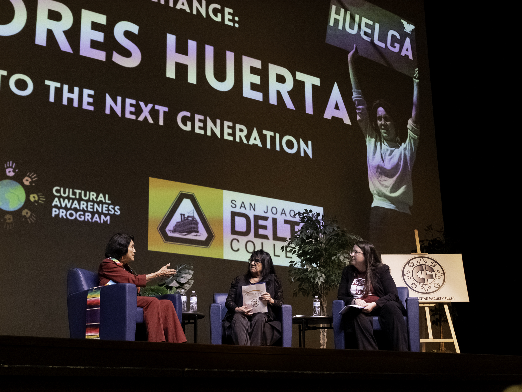 Dolores Huerta (left) speaks during a panel discussion at San Joaquin Delta College alongside board president Janet Rivera (center) and history professor Dr. Sarah Seekatz (right) on Sept. 26