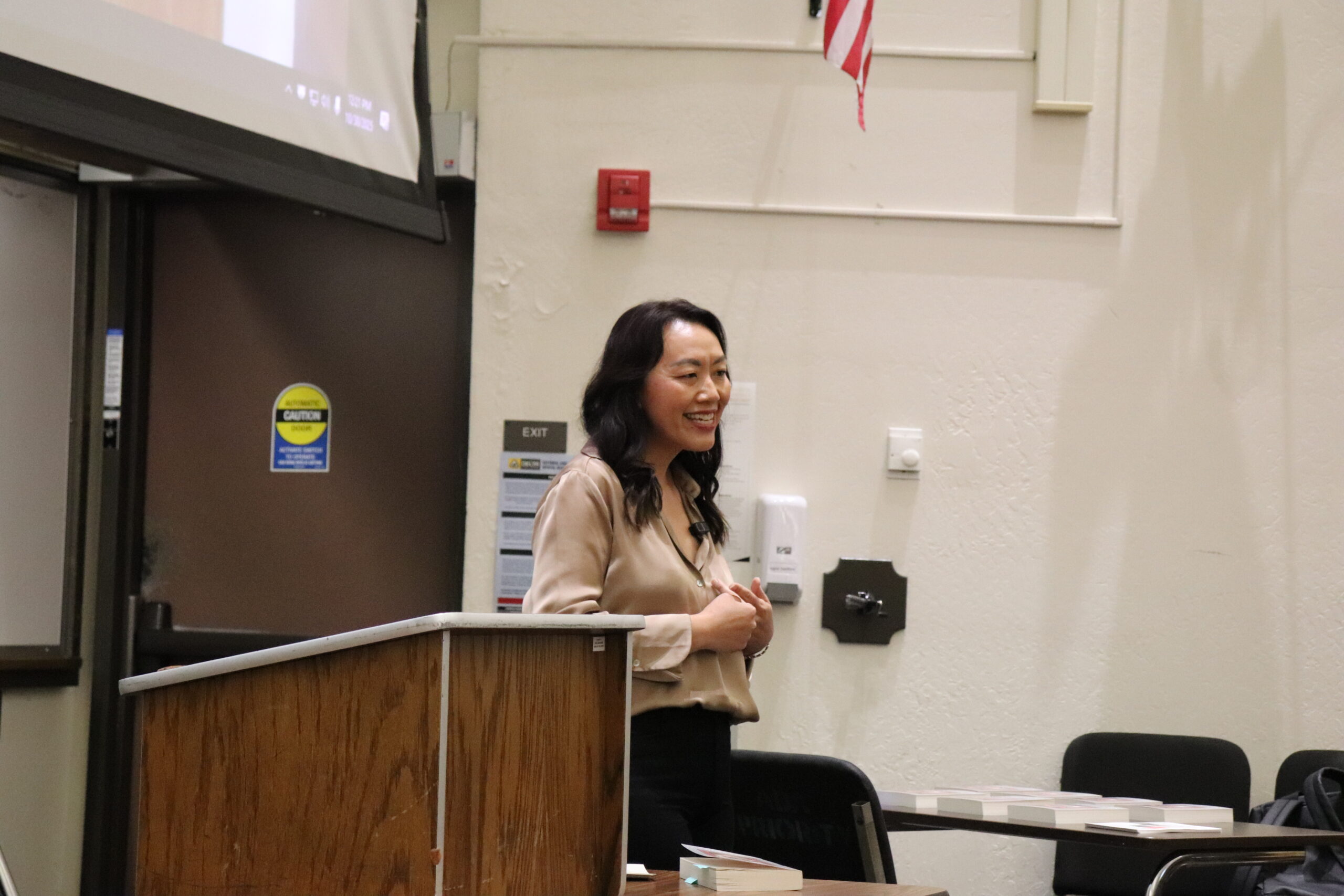 Yia Vang speaking to attendees in the Dawn Mabalon forum on Oct 30.