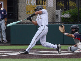 Infielder No. 34 Maximiliano Garcia hits the ball on Wednesday, April 22, against American River on their home turf at San Joaquin Delta College. PHOTO BY AZRIEL DRUMHELLER